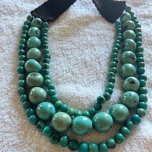 Elegant Turquoise Beaded Necklace 3 strand, like new , solid piece of jewelry.
